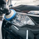 repair-workshop-specialist-cleaning-headlight-with-2021-09-07-20-59-13-utc